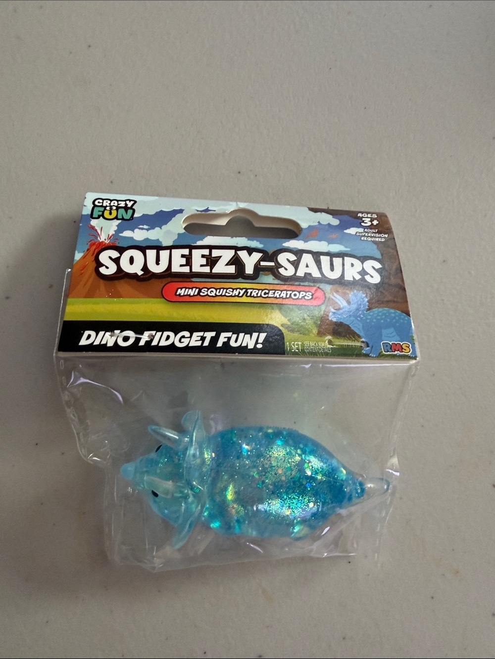 Squeezy-Saurs Blue Glitter Triceratops - Dino Fidget Toy